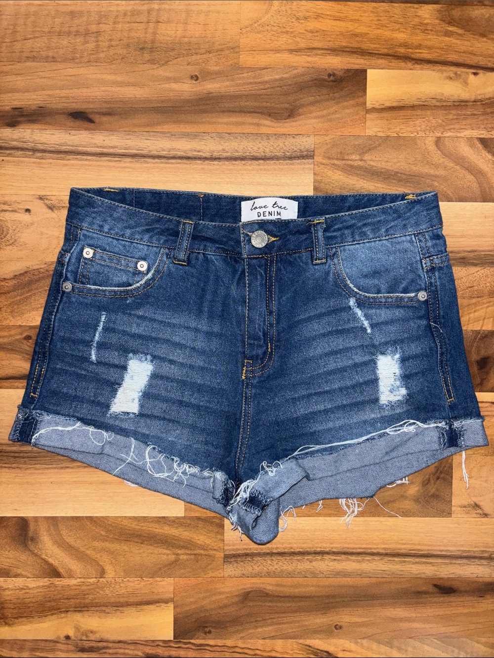 Never worn! Love Tree Dark Blue Distressed Denim Cutoff Shorts